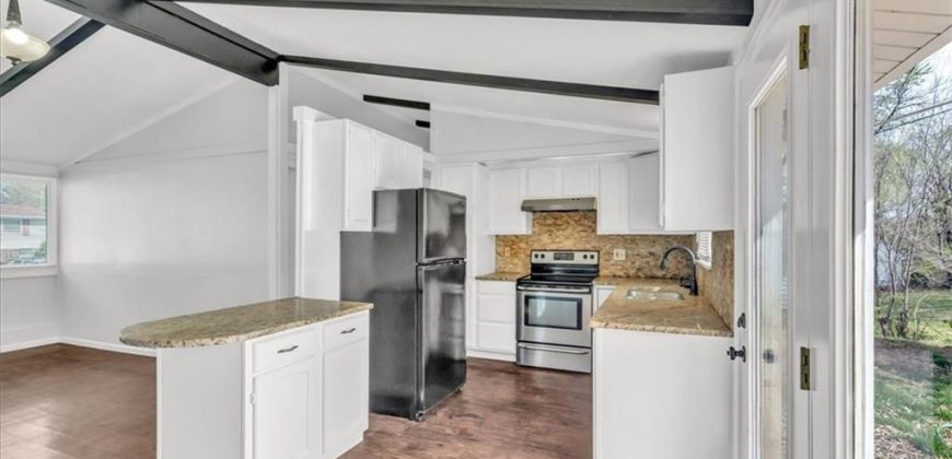 Homes for Sale in Kansas City, MO 64118 | 5713 N Woodland Avenue