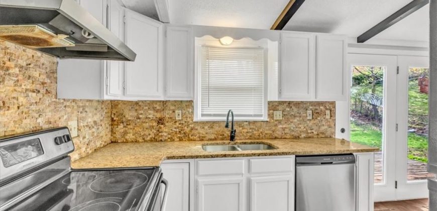 Homes for Sale in Kansas City, MO 64118 | 5713 N Woodland Avenue