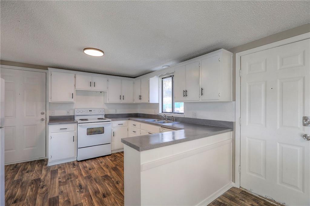 Homes for Sale in Kansas City, MO 64116 | 230 NE Evansdale Road