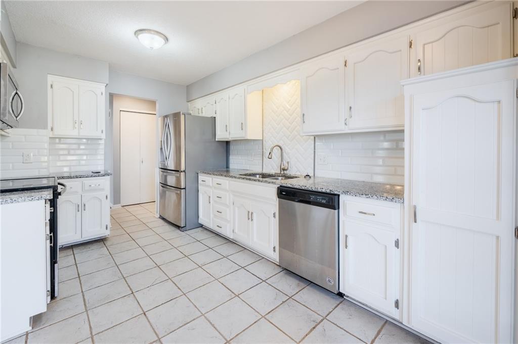 Homes for Sale in Kansas City, MO 64118 | 7801 N Garfield Avenue