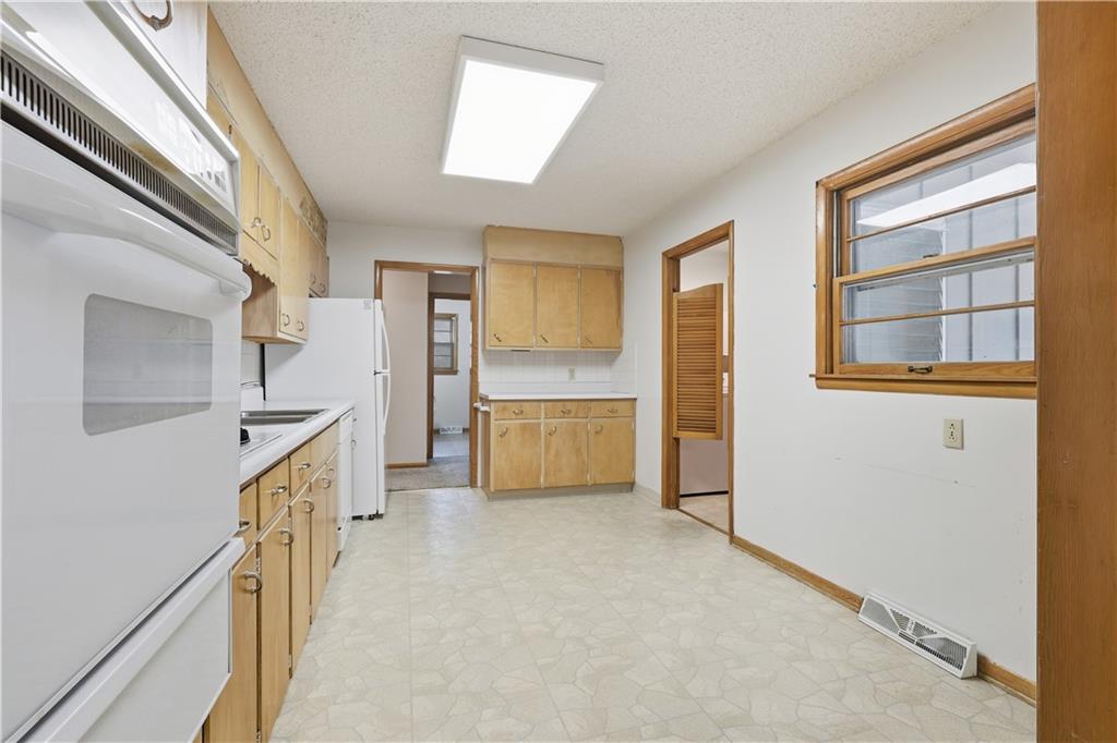 Homes for Sale in Lake Waukomis, MO 64151 | 610 NW North Shore Drive