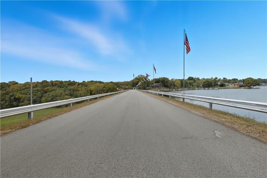 Homes for Sale in Lake Waukomis, MO 64151 | 610 NW North Shore Drive