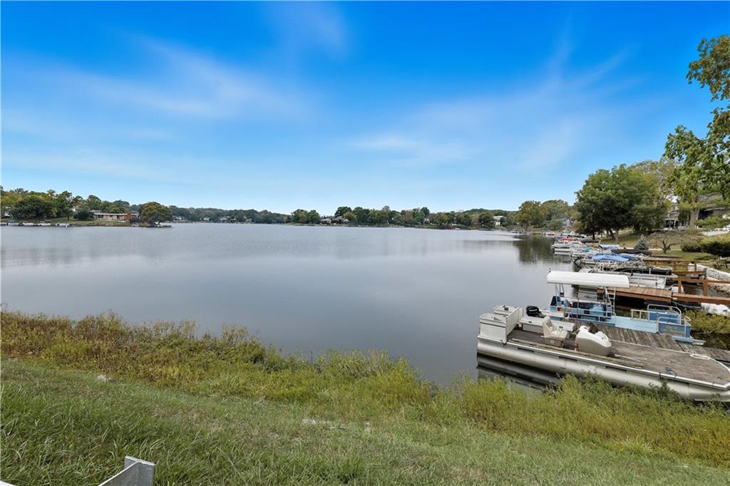 Homes for Sale in Lake Waukomis, MO 64151 | 610 NW North Shore Drive