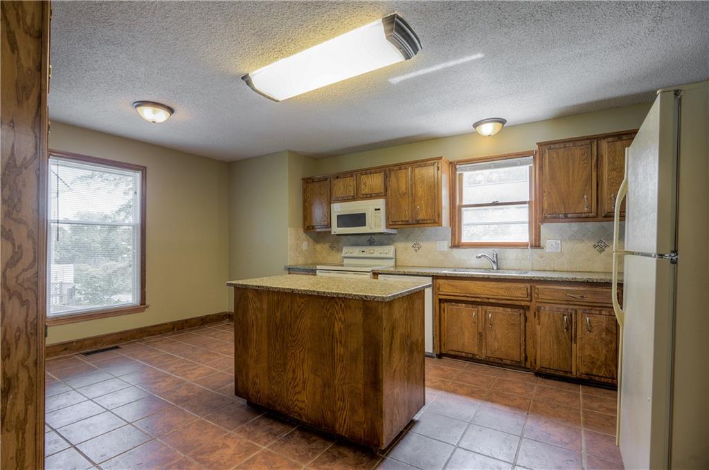 Homes for Sale in Gladstone, MO 64119 | 5835 N College Street