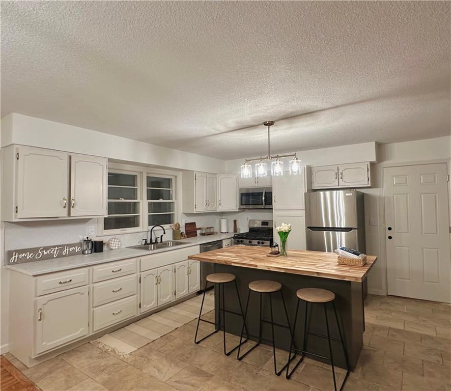 Homes for Sale in Kansas City, MO 64118 | 301 NW 81st Street